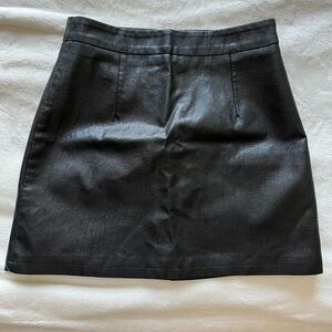 Black “leather” mini skirt